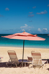 Beach umbrellas on Grace Bay Beach, Providenciales, Turks and Caicos Islands, Caribbean.