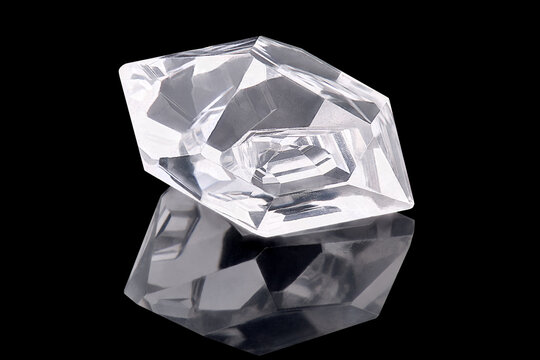 Amazing hexagonal shiny Diamond or herkimer crystal isolated on black background. Sample of Little Rich Luxury Brilliant Diamond stone specimen closeup macro. 