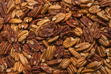 Tasty pecan-nut background. Top view.