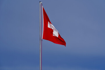 Swiss flag at ski resort of Hoch-Ybrig, Oberiberg, Switzerland.