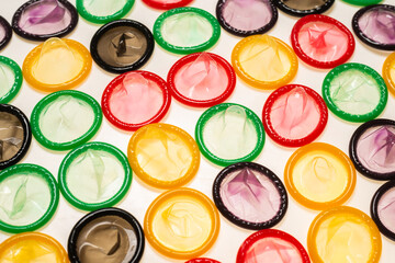 Colorful condoms background.