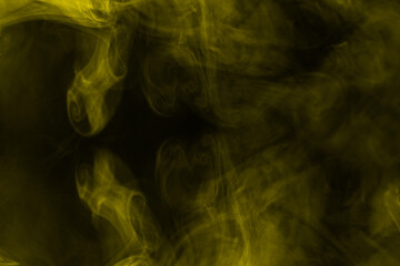 Yellow steam on a black background.