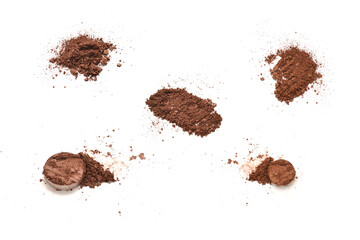 Makeup cosmetics. Eyeshadow in brown color crushed palette, colorful eye shadow powder on white background