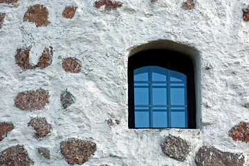 Window on a stone wall.