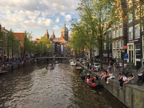 View of canals and streets in Amsterdam in spring