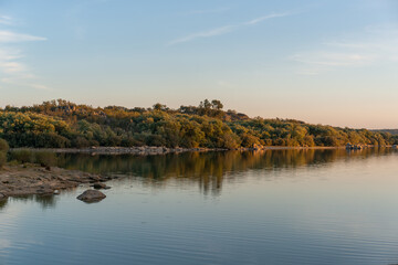 Landscape with lake reflection at sunset of Nisa Dam in Alentejo, Portugal
