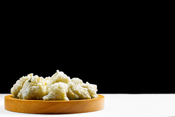 Cireng in a bowl, Traditional snack of indonesian country. With Black background