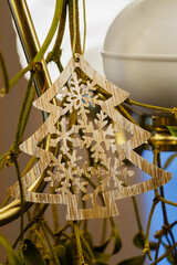 Wooden decoration carved in the shape of a tree.