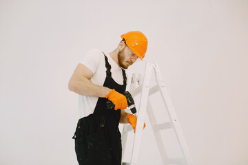 Man with special tools. Worker using screwdriver.