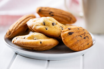 Madeleine with chocolate. Traditional French small cakes.