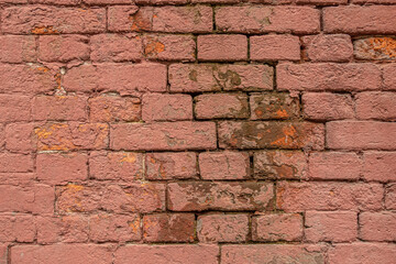 abstract background of an old red brick wall close up