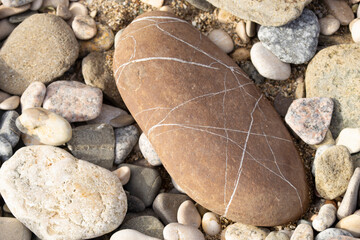Big and small rocks on the sea beach. 