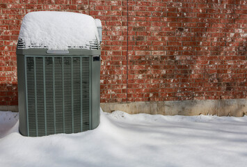 Modern high efficiency air conditioner under snow