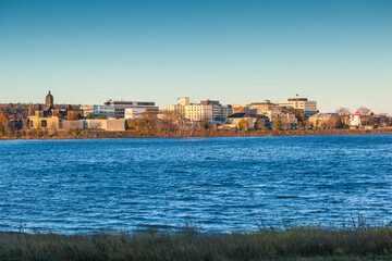 Fototapeta na wymiar Canada, Central New Brunswick, Fredericton. City skyline from the Saint John River.