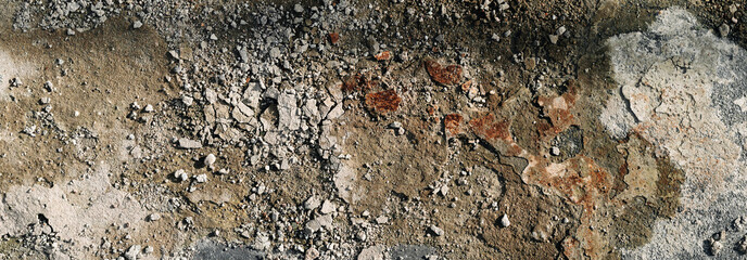Rough grunge floor surface with small crumbled remains of concrete plaster and small stones. High resolution surface texture illuminated by sunlight. Panoramic banner