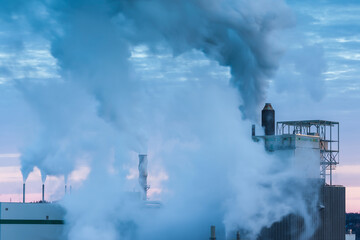 Canada, New Brunswick, Saint John. Pulp and paper factory by the Reversing Falls.