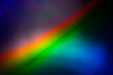 Blurred bright diagonal rainbow light refraction overlay effect for mockups. Organic diagonal...