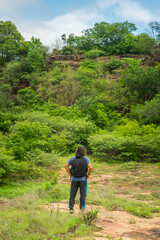 Fototapeta na wymiar Man looking at a caatinga forest in Oeiras, Piaui - Northeast Brazil