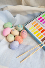 Easter, festive mood. Painted multi-colored Easter eggs which are painted with watercolor paint, hand-painted.