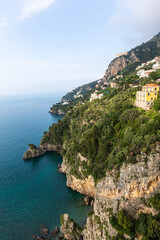 Fototapeta na wymiar Rocky shore in world famous Amalfi coast. Campania, Italy.