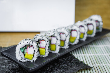 California roll on beautiful decorated plate