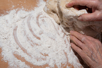 Baker kneading dough