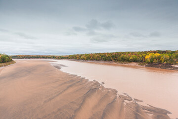 Fototapeta na wymiar Canada, Nova Scotia, Green Oaks. Fundy Tidal Interpretive Area, elevated view of huge Bay of Fundy tides on the Shubenacadie River.