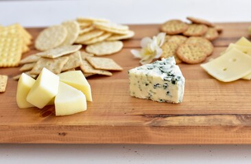Gourmet wine and cheese charcuterie platter ordering out from restaurant for romantic date night at home on special occasion holiday or birthday. Photo concept, food lifestyle, background, close-up