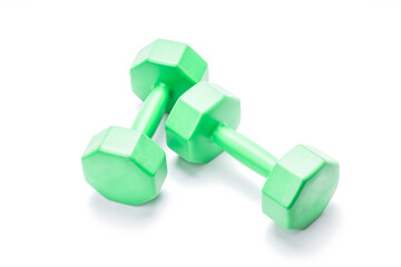 green dumbbell isolated on white background. cut out barbell with fixed weight. gym equipment