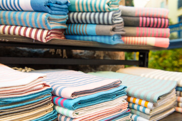 Striped rolls of fabric