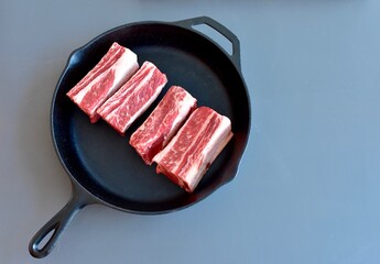 Whole fresh organic ingredients to prepare delicious homemade simple recipe braised beef skillet dinner. Photo concept food, top view, copy space