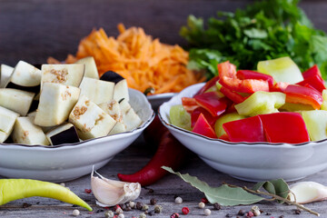 Chopped vegetables (bell peppers, carrots, eggplants) for canning. Autumn preparations.