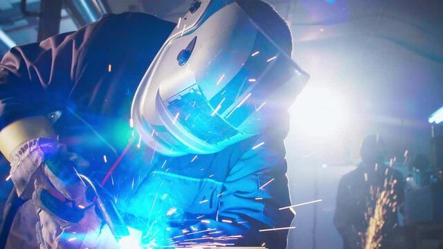 Close up of a welder welding