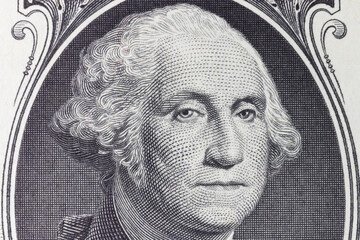 President George Washington on the obverse of a one dollar bill for background.