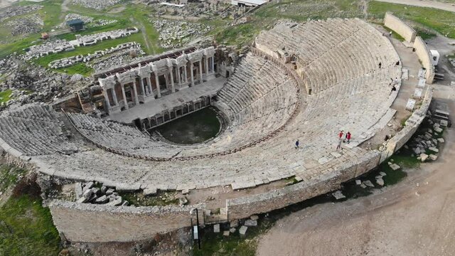 Aerial drone view of amphitheater in the ancient city of Hierapolis, Pamukkale, Turkey. High quality 4k footage