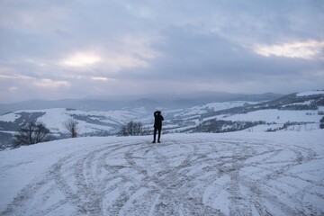 Fototapeta na wymiar Winter in the mountains. Panorama, blue sky, clouds. Carpathian mountains 