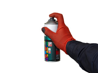 A man holds an aluminum spray can with graffiti or airbrushing paint in his hand with a red glove...