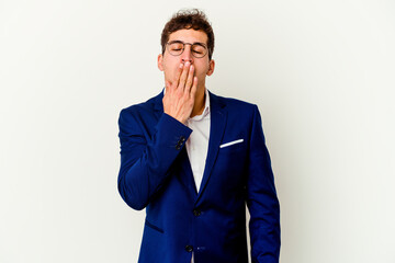 Young business caucasian man isolated on white background yawning showing a tired gesture covering mouth with hand.