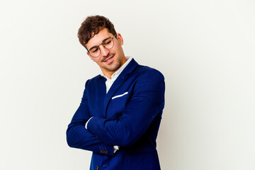 Young business caucasian man isolated on white background laughing and having fun.
