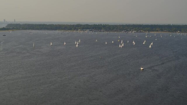 Slow Aerial Tilt Up Of Sail Boats On Manhasset Bay Long Island