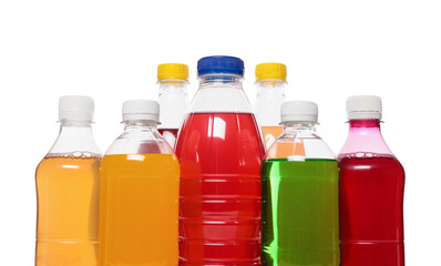 Bottles of soft drinks on white background, closeup