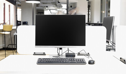 Desktop computer with portable system unit and keyboard and mouse in modern office
