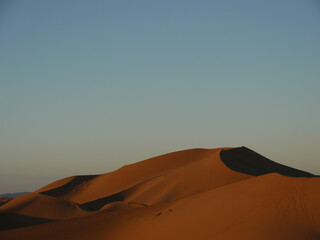 Fototapeta na wymiar sand dunes desert sahara morocco sunset