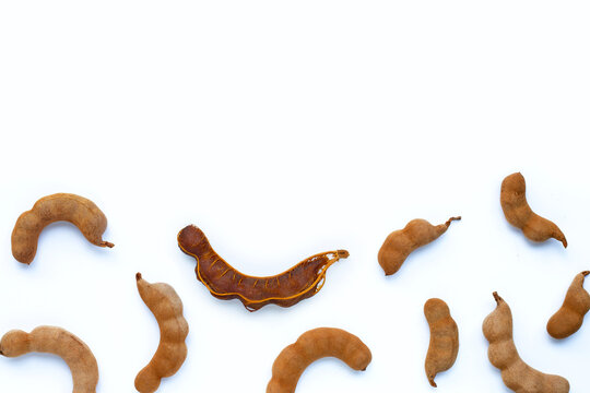 Tamarind tropical fruit on white background. Top view