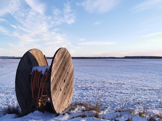 Glas Fibre cable for fast internet on a snowy meadow