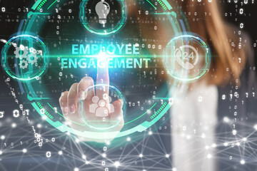 Business, Technology, Internet and network concept. Young businessman working on a virtual screen of the future and sees the inscription: Employee engagement