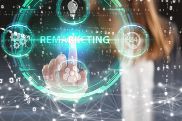 Business, Technology, Internet and network concept. Young businessman working on a virtual screen of the future and sees the inscription: Remarketing