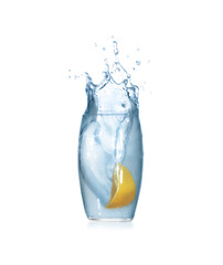 Lemon slice falling into glass of water on white background