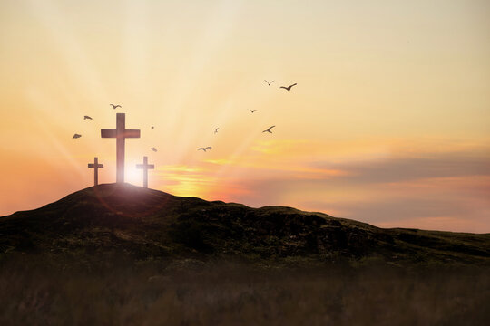 Christian crosses on hill outdoors at sunset. Crucifixion Of Jesus