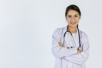 Portrait of a beautiful female doctor posing to take a photo on white background